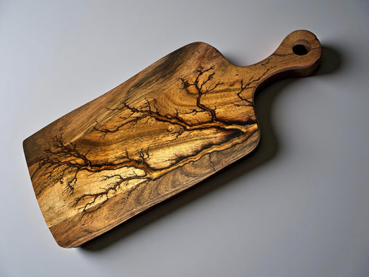 Australian resin paddle board with copper metallic resin and lightning fractal burn pattern, handmade acacia cheese board East Gippsland, Fractal Flow Designs