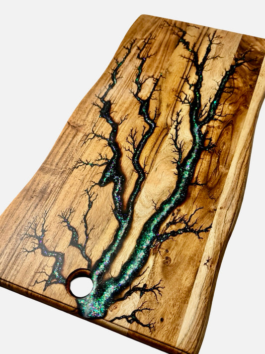 Premium live edge serving board with vibrant green sparkle resin inlay and lightning fractal burn design across natural timber, Fractal Flow Designs