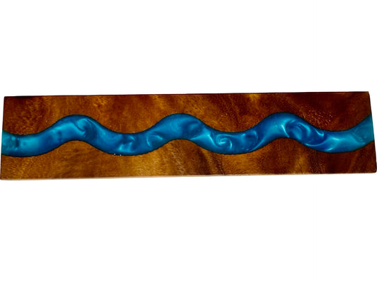 kitchen magnetic knife holder featuring a blue resin river made in australia by fractal flow designs