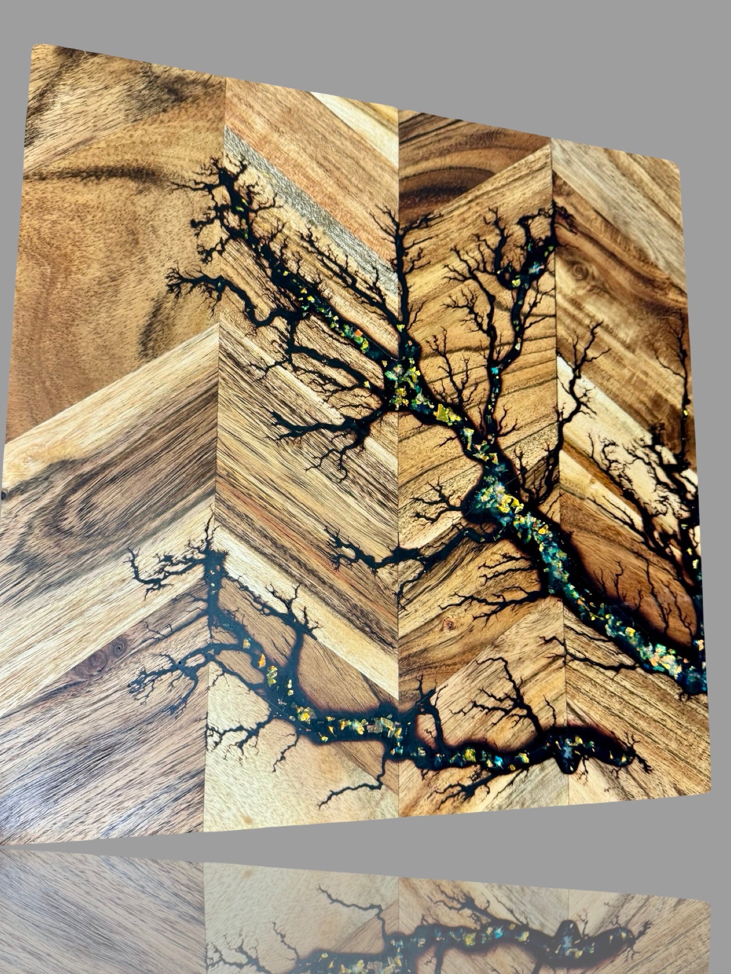 Resin chopping board handmade in East Gippsland, premium artisan board with bold fractal electric design