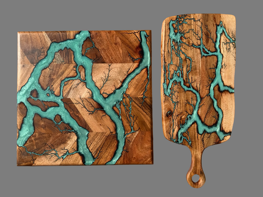 Australian acacia resin board gift set featuring cheese board paddle and chopping board with teal green resin art wok by fractal flow designs , premium craftsmanship