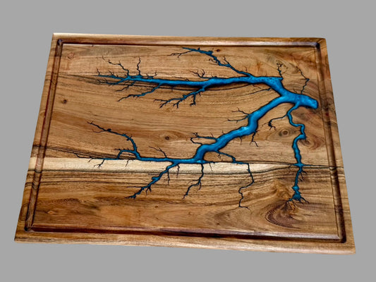 Handmade large acacia cutting board featuring flowing sky blue resin artwork and unique fractal burn detailing, Australian timber kitchen and serving board gift