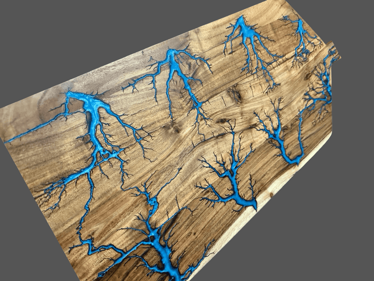 Grazing platter boards by Fractal Flow Designs – handcrafted from Australian hardwood with bold resin inlays and fractal burning. Premium serving boards for charcuterie, cheese, and entertaining. Artisan timber platters made in Bairnsdale Victoria.