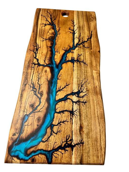 live edge board with fracgtal burning art inlayed with food safe resin made by fractal flow designs