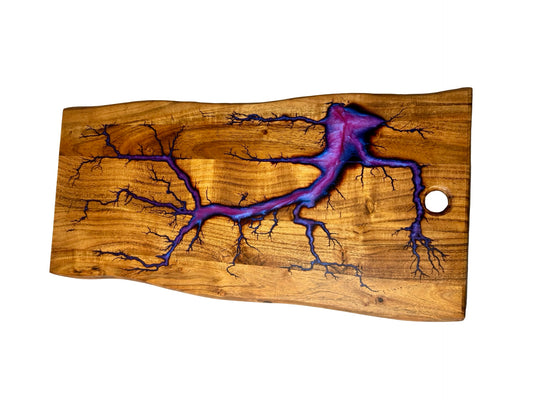 purple resin inlayed into  acacia board eatring fractal burning art created by electricity made by fractal flow designs in australia