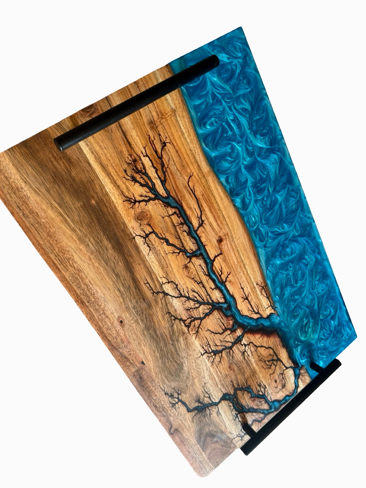 Sky blue resin river grazing board with lightning fractal burn across acacia timber and black handles for serving, handcrafted Australian resin board, Fractal Flow Designs