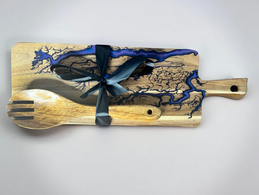 Rectangle Cheese board with purple resin artwork which is resin inlayed after a fractal burning process and pair with 2 wooden utensils made from teak wood making a fantastic gift set made in australia