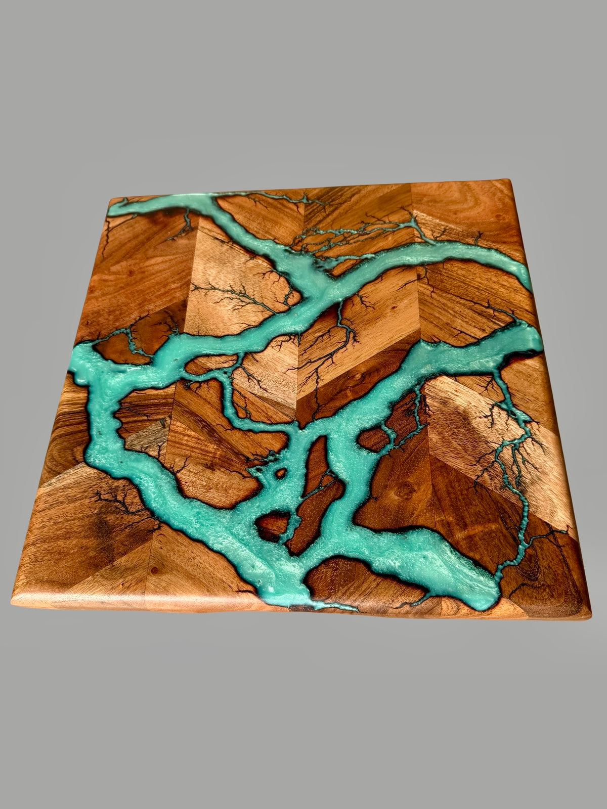 Acacia chopping board with iridescent green resin art made in Australia by fractal  flow designs in Victoria 