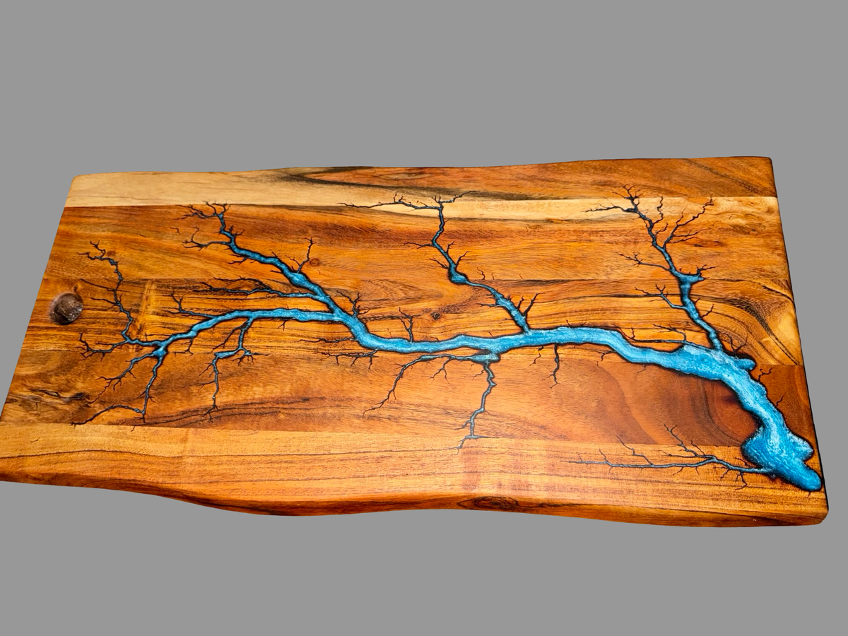 One of a kind Australian timber charcuterie board featuring electric sky blue resin artwork