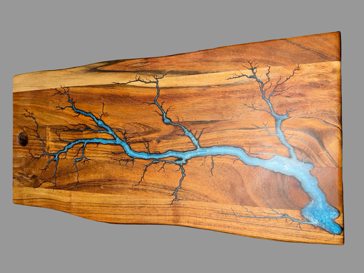 Luxury sky blue epoxy resin charcuterie board handcrafted in Australia with natural timber grain