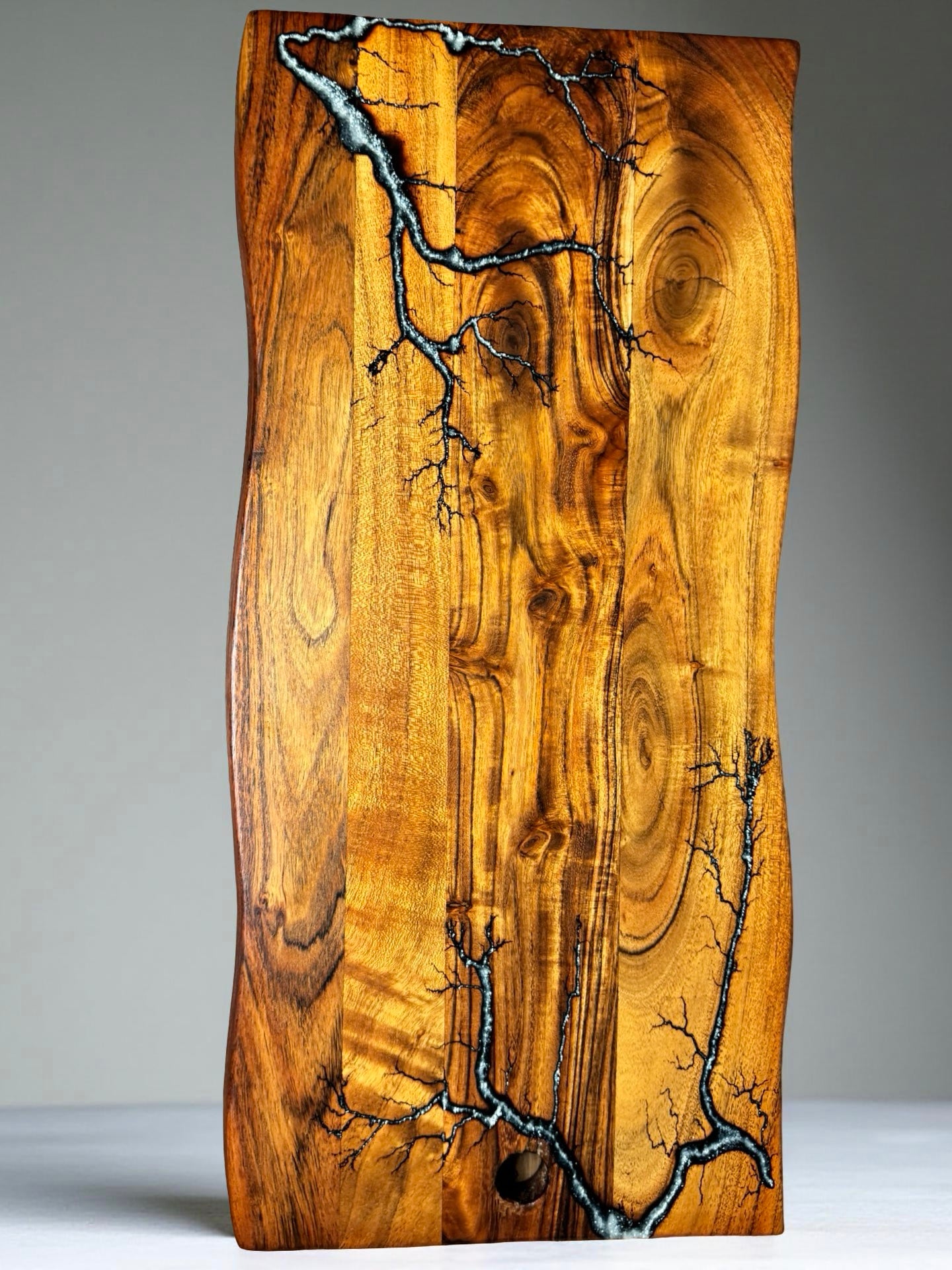 Reflective silver resin live edge board resin boards Australia handcrafted timber with bold fractal burning art