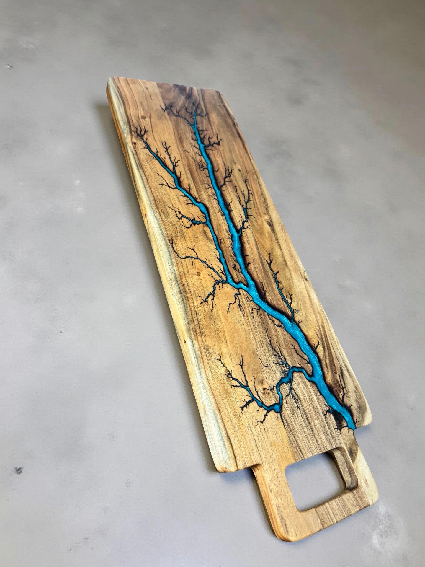 Handmade long grazing board with lagoon blue electric resin art, East Gippsland artisan