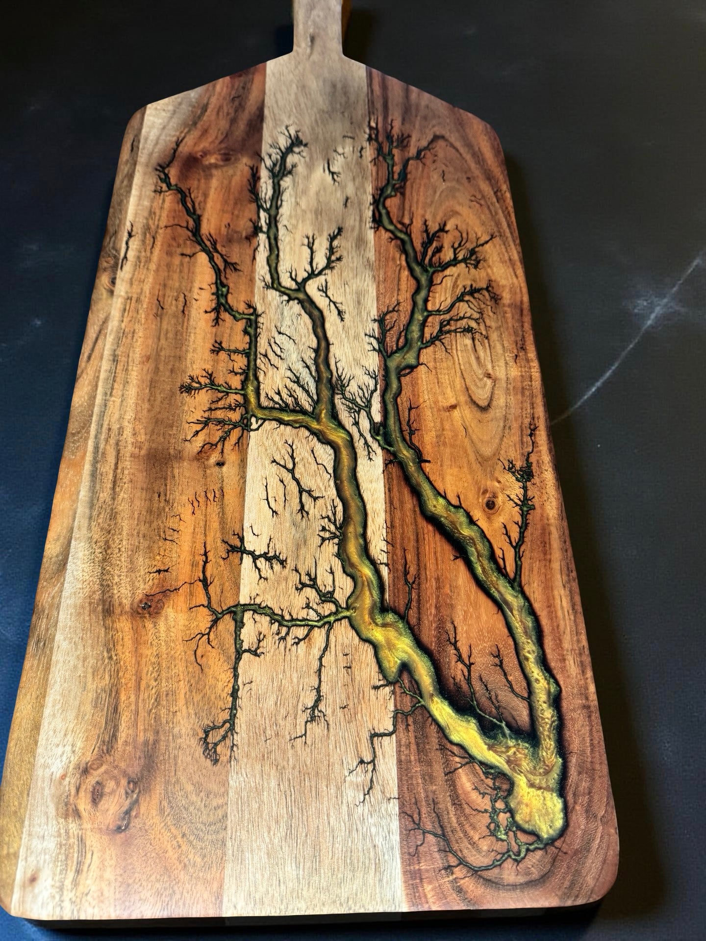 Resin paddle board with electric fractal inspired detail crafted from sustainable local timber
