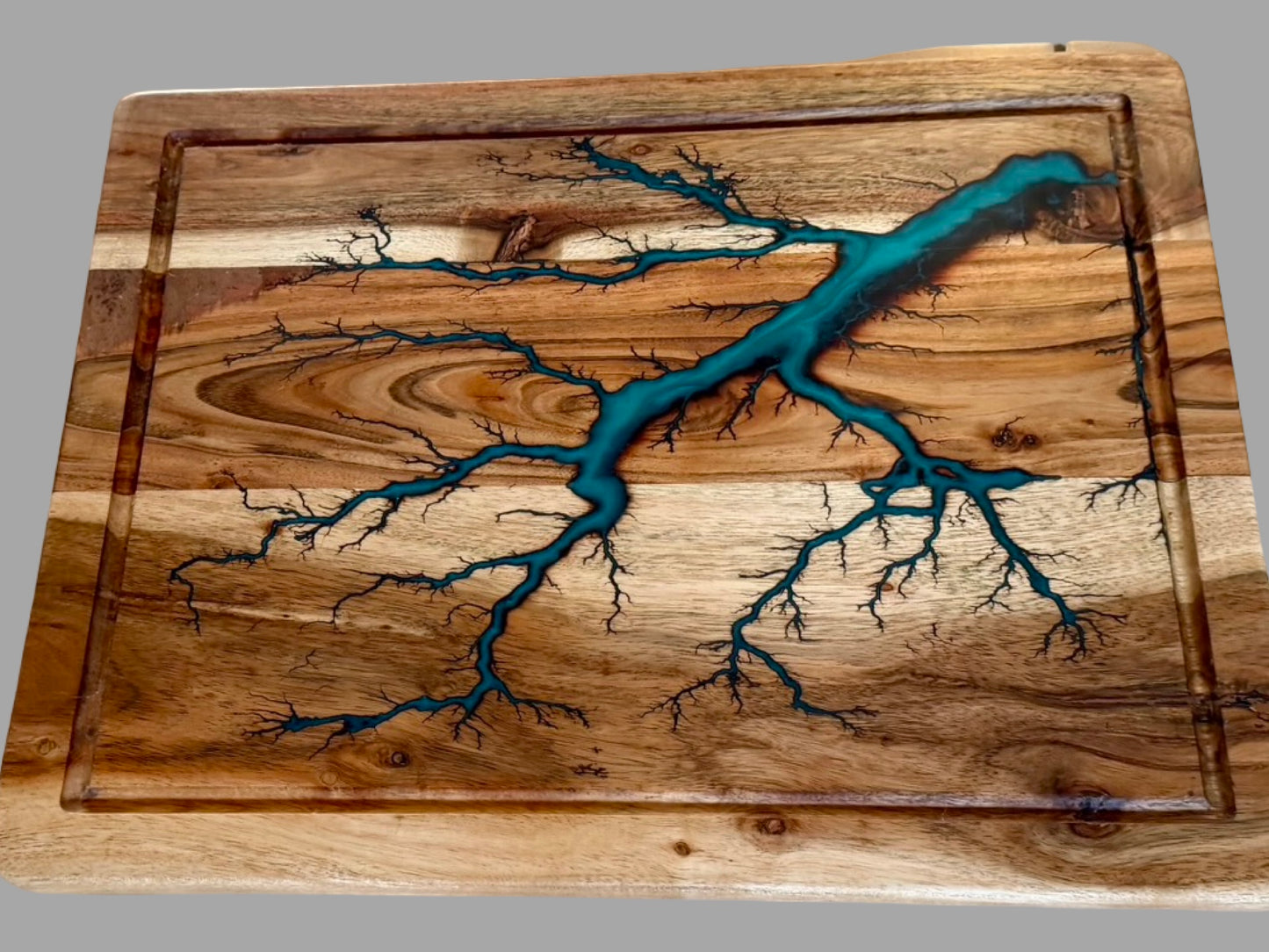     One of a kind large acacia chopping board with vibrant marine green resin art, premium Australian timber, handcrafted for everyday cooking and entertaining