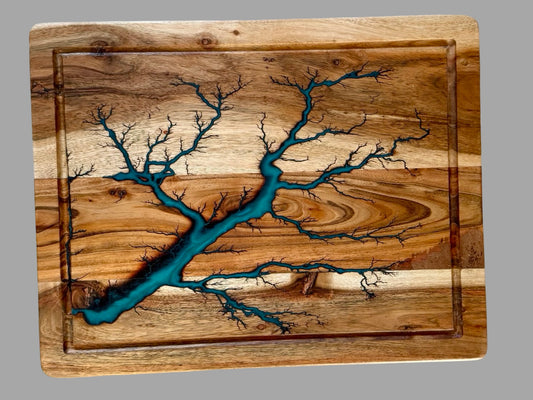     Premium large acacia cutting board featuring shimmering marine green resin inlay with intricate fractal burn patterns, handmade Australian timber gift